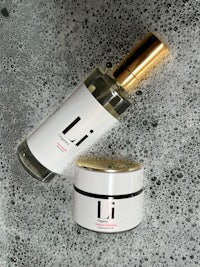a bottle of li and a bottle of soap on a table
